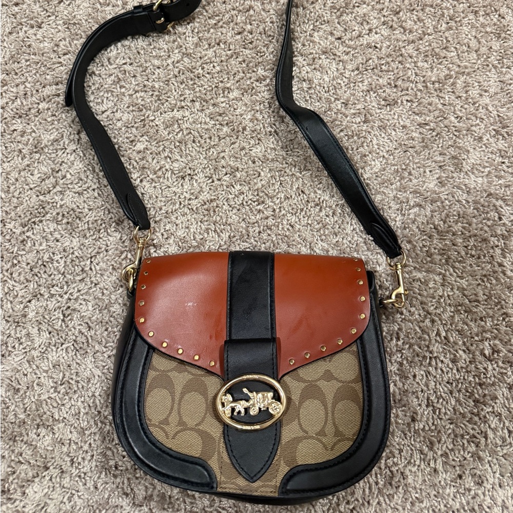 Coach Georgie Saddle Bag in color block signature canvas with rivets